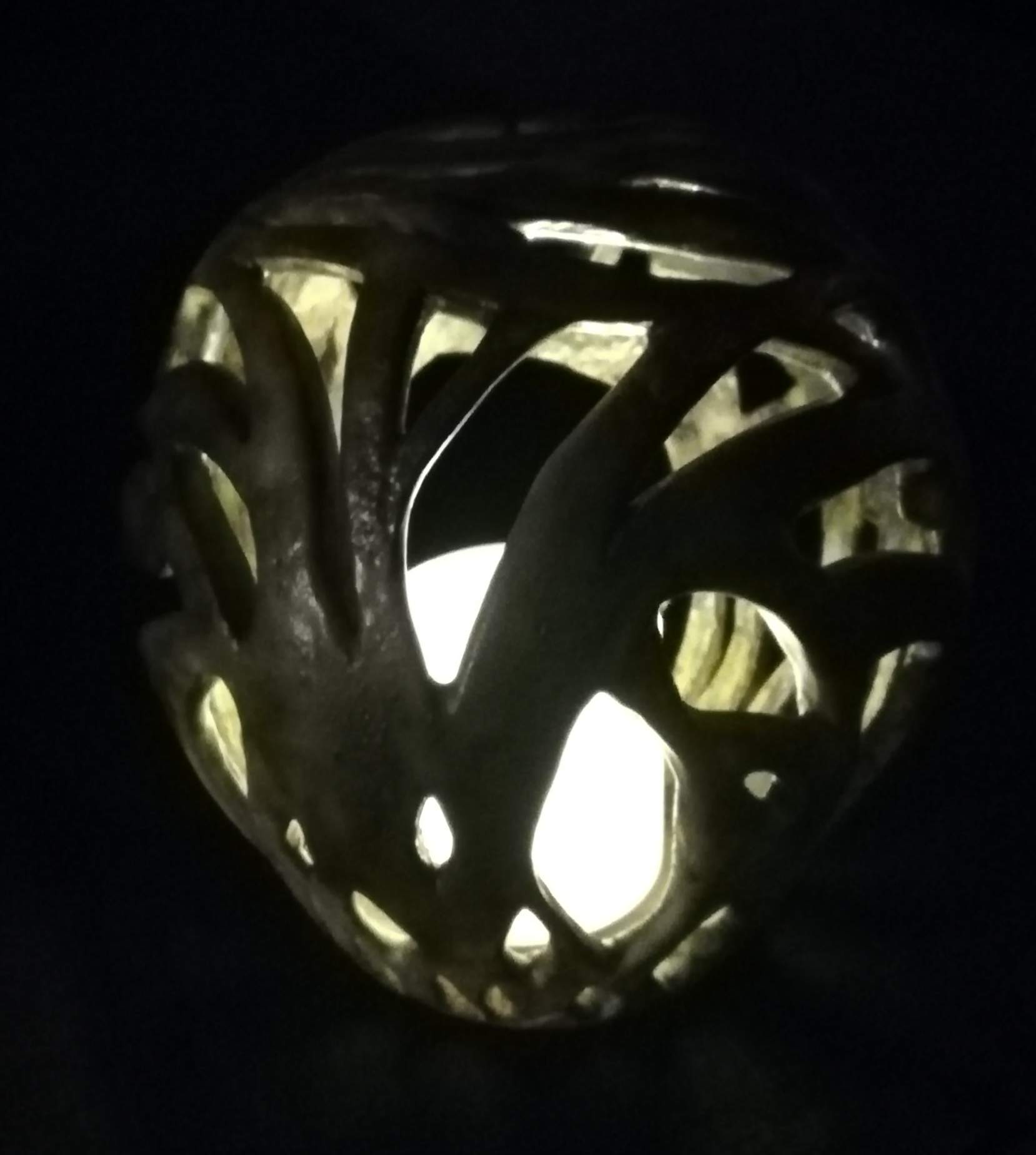 Lantern with light. Stoneware.