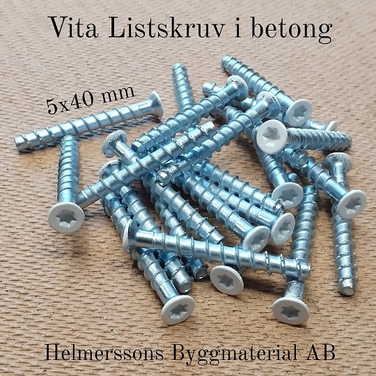 Vita listskruv i betong